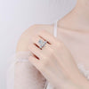Deep V Pear Shaped Halo Moissanite Ring Sterling Silver