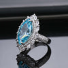 Pavé Burst Halo Marquise Cut Sapphire Birthstone Ring