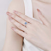 Pavé Floating Halo Blue Moissanite Ring Sterling Silver