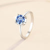 Pavé Floating Halo Blue Moissanite Ring Sterling Silver