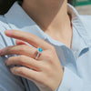 Pavé Flower Halo Moissanite Ring Sterling Silver