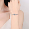 Pavé Round Halo Moissanite Bracelet Sterling Silver