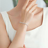 Four Prong Round Cut Lab Grown Diamond Tennis Bracelet in 18K White Gold