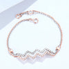Petite Two-tone Wave Shape Lab Grown Diamond Bracelet in 18K Gold